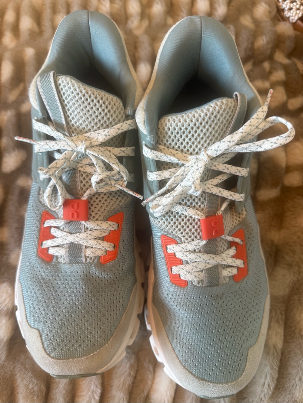 On Running Light Blue Mesh Athletic Sneakers with Orange Accents